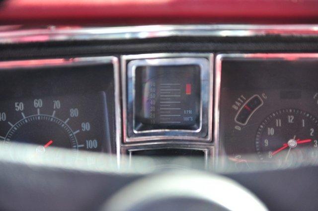 A close up of the dashboard of a car.