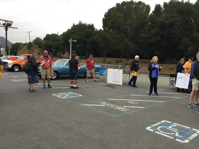 A Group of People Standing in the Parking Lot